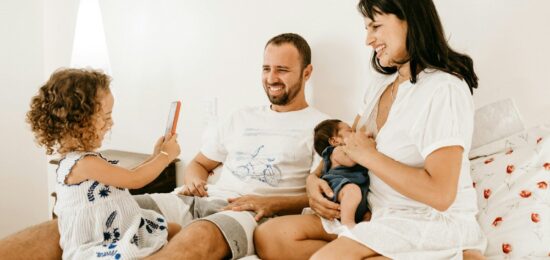 Photo by Jonathan Borba man in white crew neck t-shirt sitting beside woman in white crew neck t-shirt
